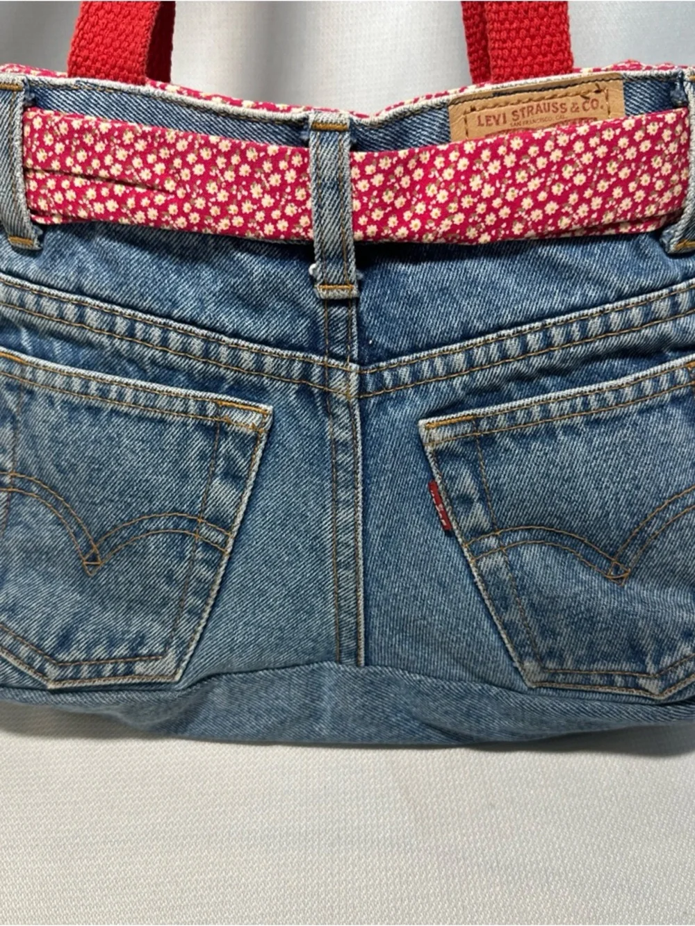 Levi's Denim Shoulder Bag with Red Floral Bow and Red Straps - Picture 3 of 7